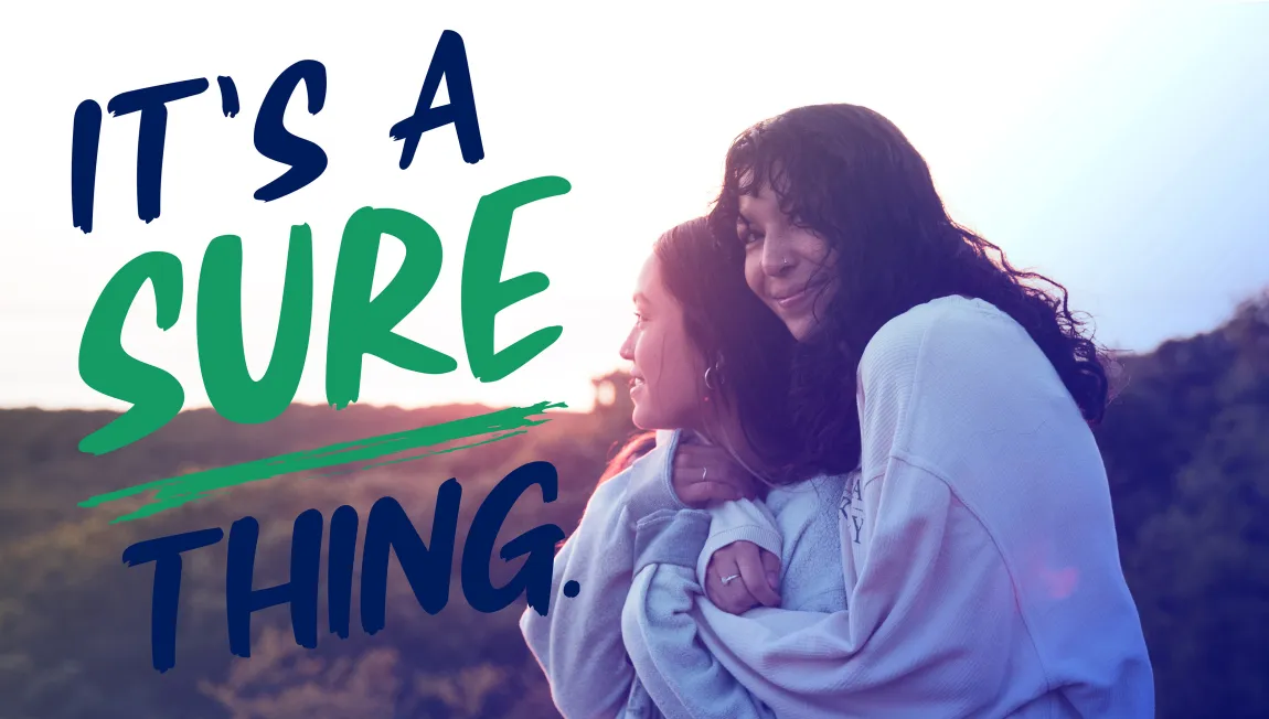 It's a sure thing. Two students watching a sunrise with the text "It's a Sure Thing" overlaying the image.